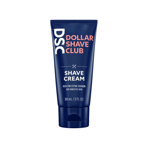 Dollar Shave Club Shave Cream travel size product image against blank backdrop.